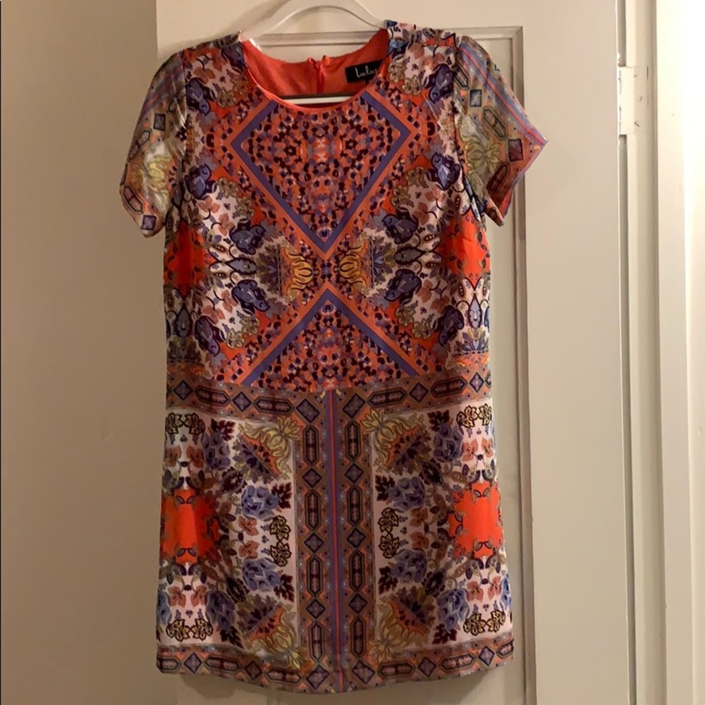 Short, patterned, short sleeved dress.